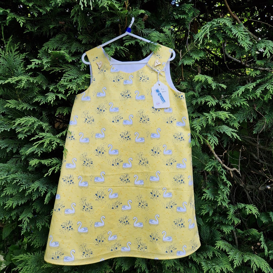 Age: 5-6yr Yellow Swan dress. 