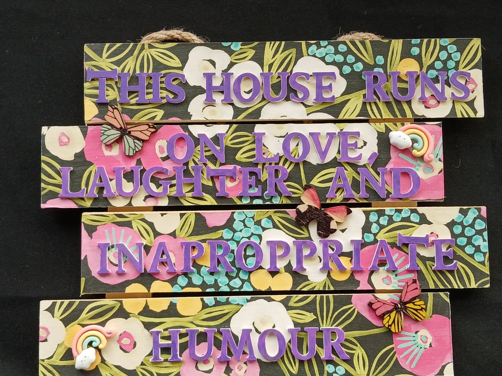 Hand decorated hanging wooden sign 