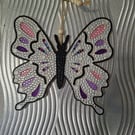 Large sequinned butterfly. 