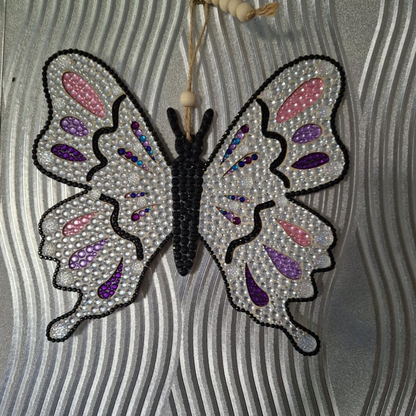 Large sequinned butterfly. 