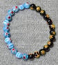 Pale Blue and Black-Amber Millefiori Bead Elastic Half and Half Bracelet - Image 2