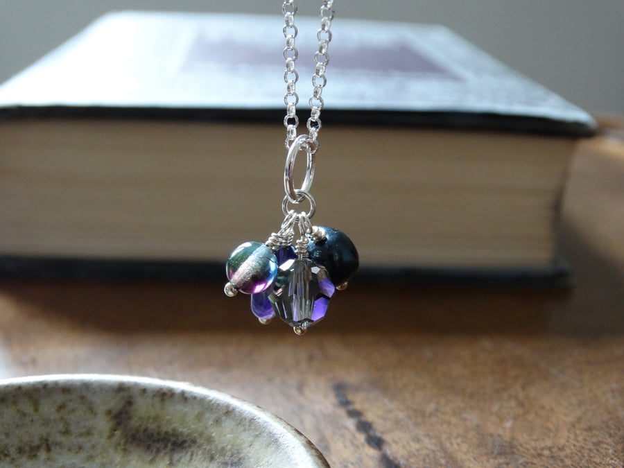 Semi-precious gemstone charm cluster pendant in stormy tones