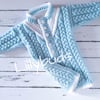 Knitting pattern for Cullen Baby Romper. Aran all-in-one. Cabled Onesie