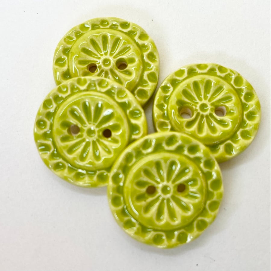 Set of four handmade ceramic buttons green