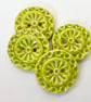 Set of four handmade ceramic buttons green