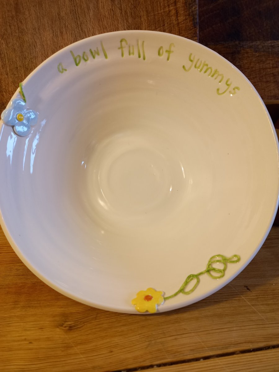 Hand Thrown Bowl with inscription and flower design