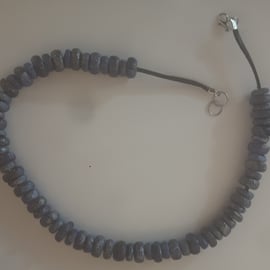 Blue beaded thong bracelet and necklace set.