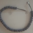 Blue beaded thong bracelet and necklace set.