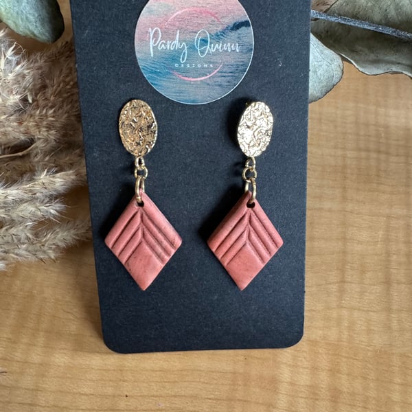 Bronze and gold earrings