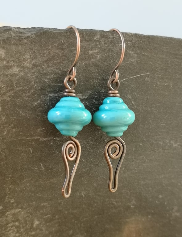Copper earrings with teal lamp work bead and wire work