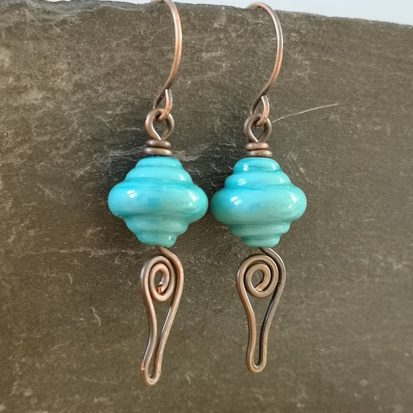 Copper earrings with teal lamp work bead and wire work