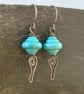 Copper earrings with teal lamp work bead and wire work - Image 1