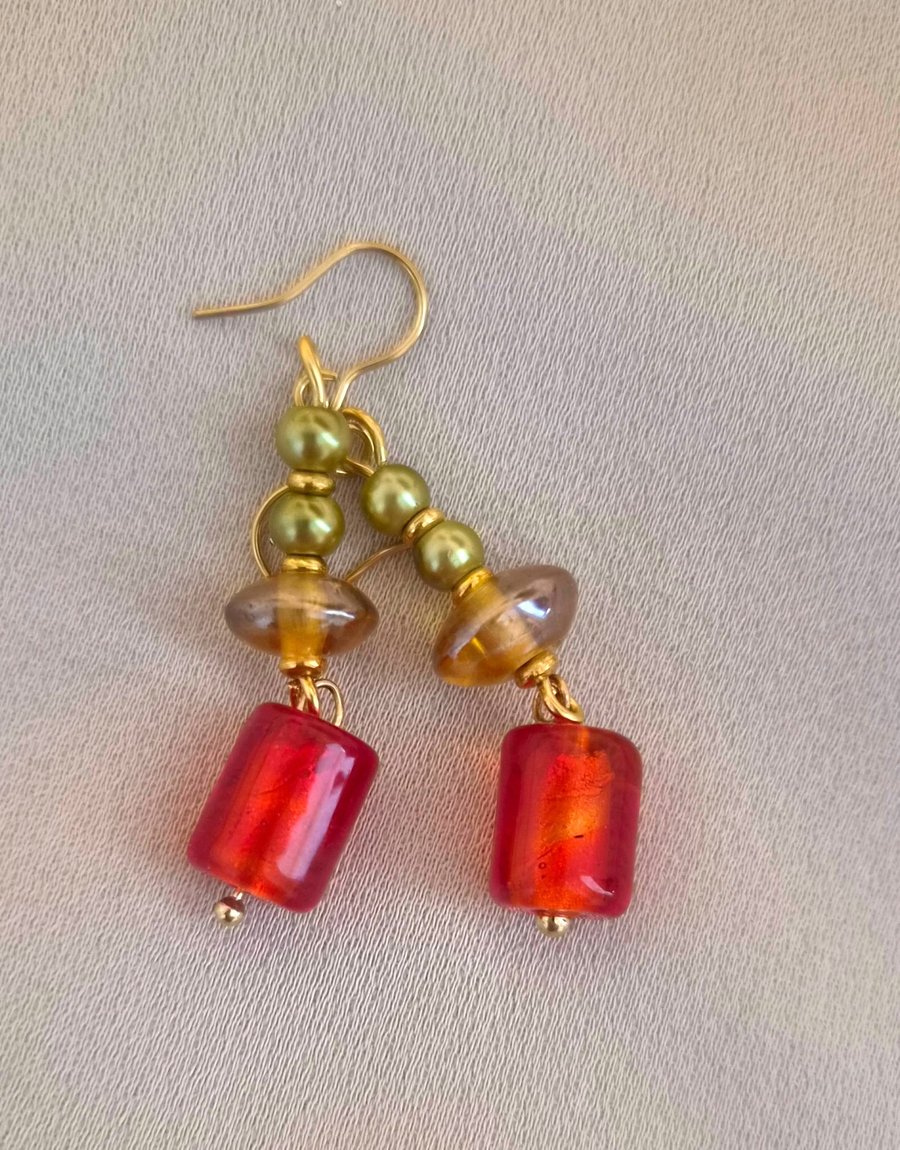 Red glass foil bead with olive, amber and gold trim - Folksy