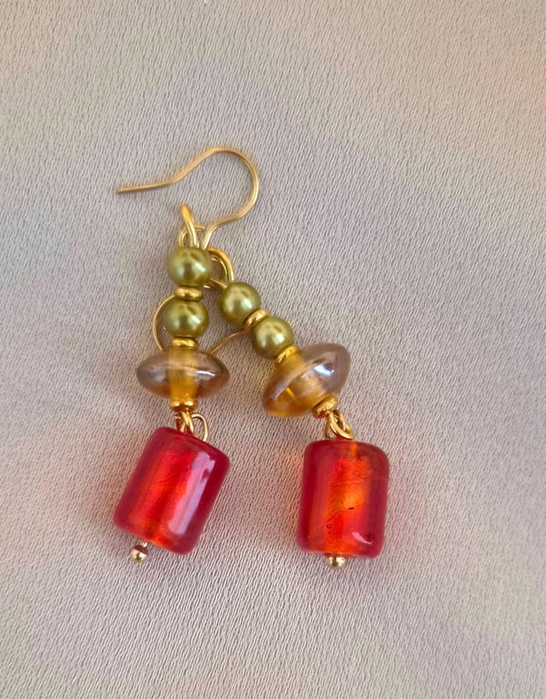 Red glass foil bead with olive, amber and gold trim