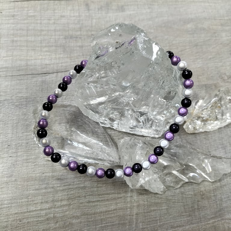 AL146B  Purple, black and silver miracle bead elasticated anklet, 10.5" 