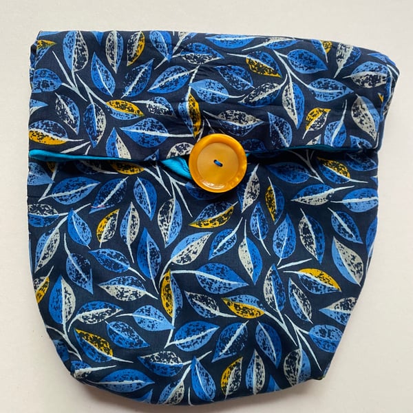 Fully lined button fastening tidy all bag.