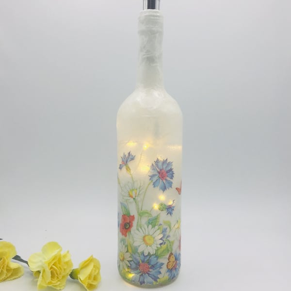 Decoupage bottle light with summer flowers