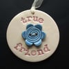 Ceramic decoration with flower button True Friend