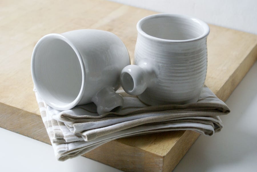 Two tulip shaped mugs - hand thrown stoneware glazed in brilliant white