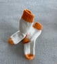 Orange and white baby socks - Image 3