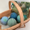 Tumble dryer balls made from waste and felted wool. Blues and greens