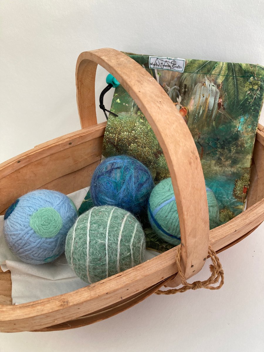 Tumble dryer balls made from waste and felted wool. Blues and greens