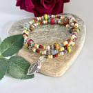 Colourful handmade Czech glass memory wire wrap bracelet in warm summer shades