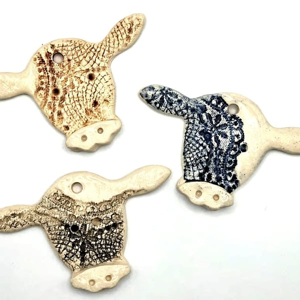 Ceramic cow hanging decoration