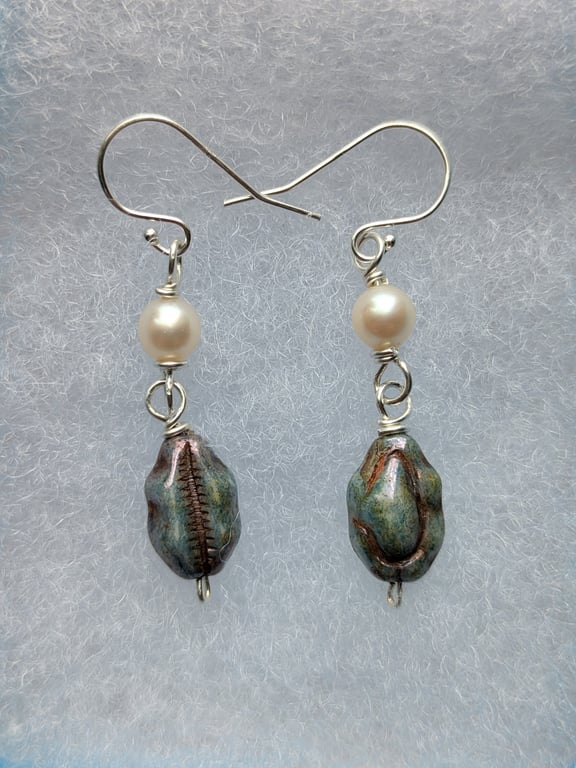 The Shell For Your Shell-Like earrings. Sterling silver wire wrapped pearl