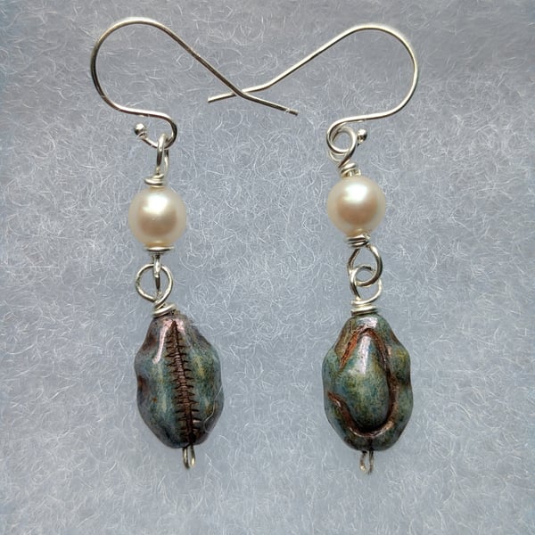 The Shell For Your Shell-Like earrings. Sterling silver wire wrapped pearl
