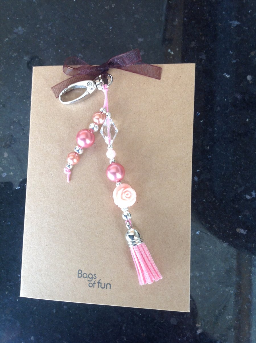 A6 kraft card with bag charm attached