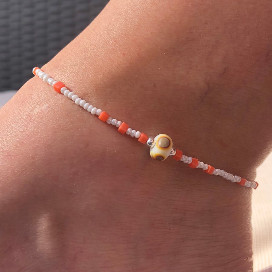 White & peach beaded anklet with focal lampwork bead. Sterling Silver anklet. 