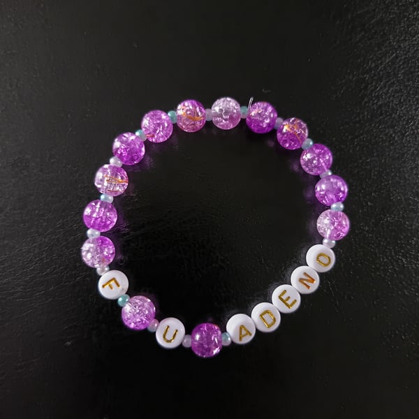 Elasticated adenomyosis letter bracelet with purple and pearl beads