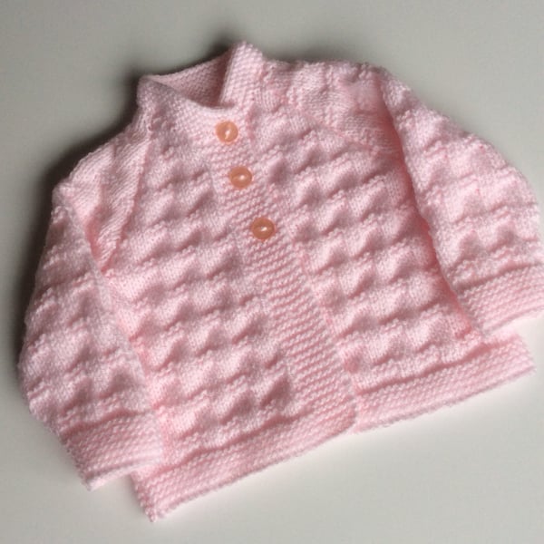 Hand knitted pink baby cardigan 