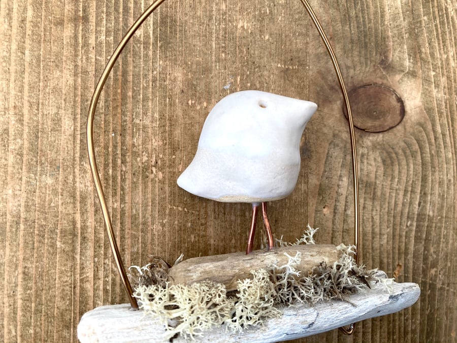 Wire art, bird on a driftwood wire, wire sculpture