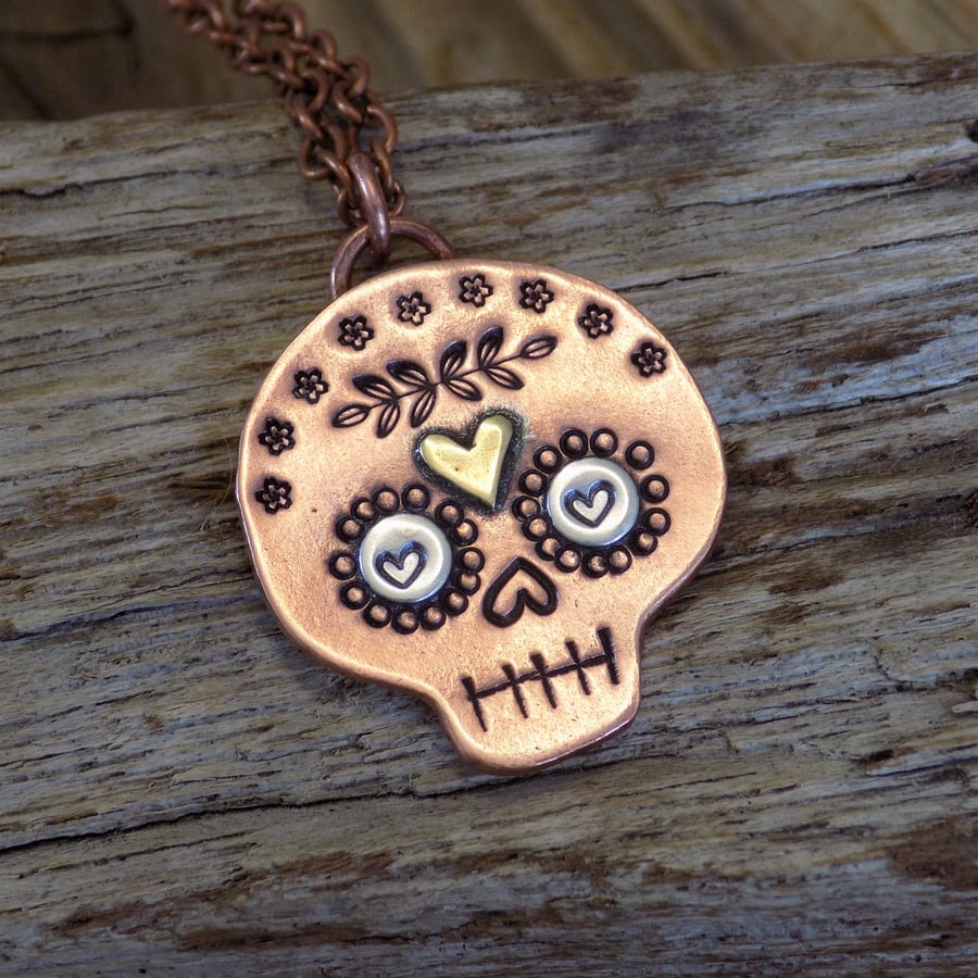 Copper ,silver and brass 'day of the dead, sugar skull' mixed metal pendant 