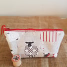 Zipped pouch: sheep with red.