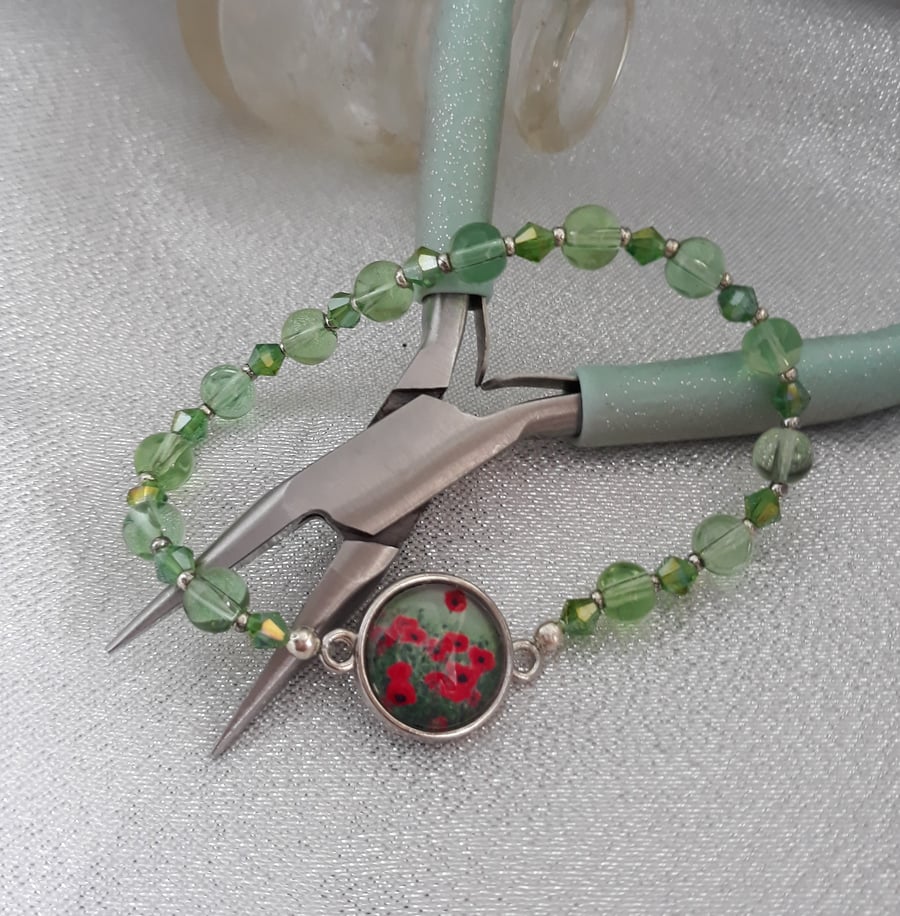 BR225 green beaded poppy bracelet
