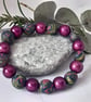 Navy, hot pink and metallic green polymer clay stretch beaded bracelet