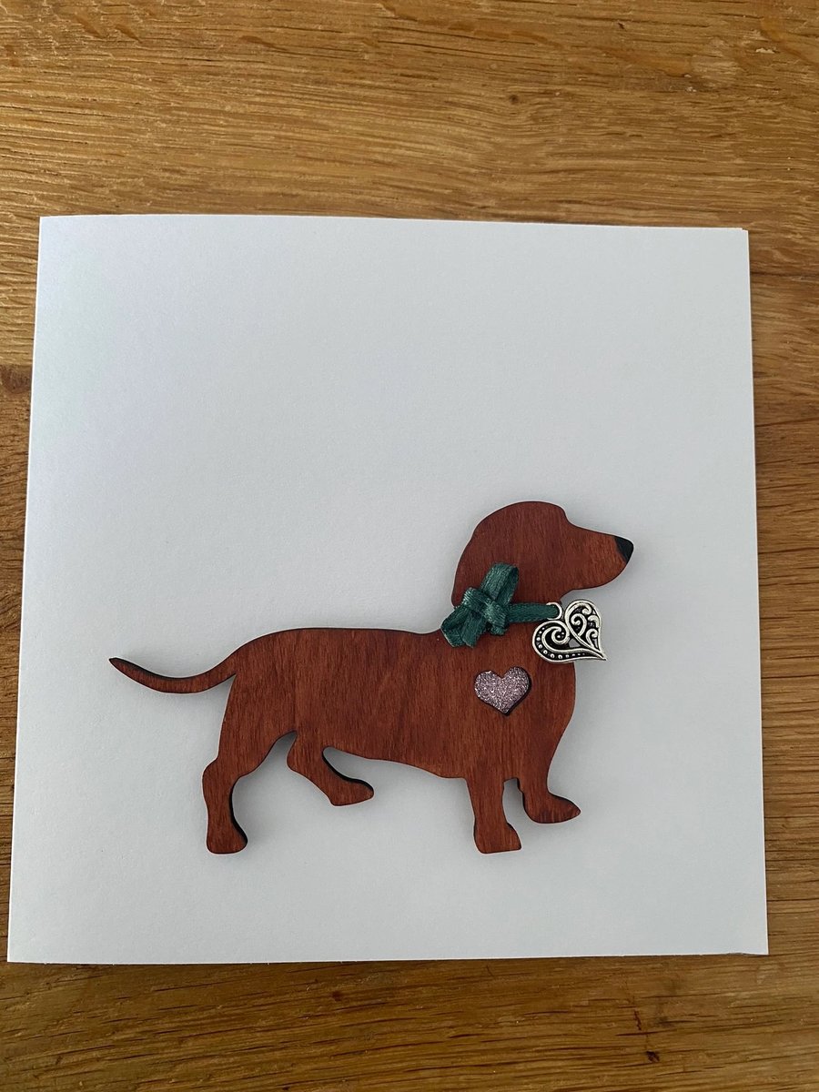 Dachshund sausage dog with heart charm greeting card