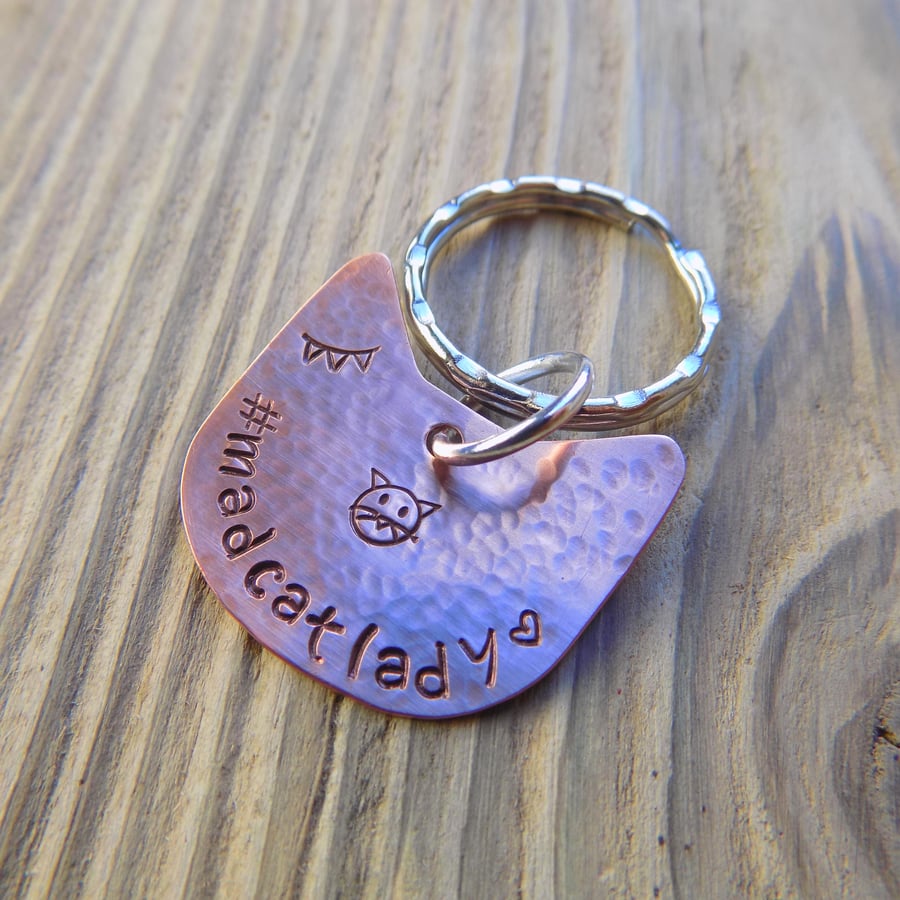 Hand sawn cat head copper stamped keyring