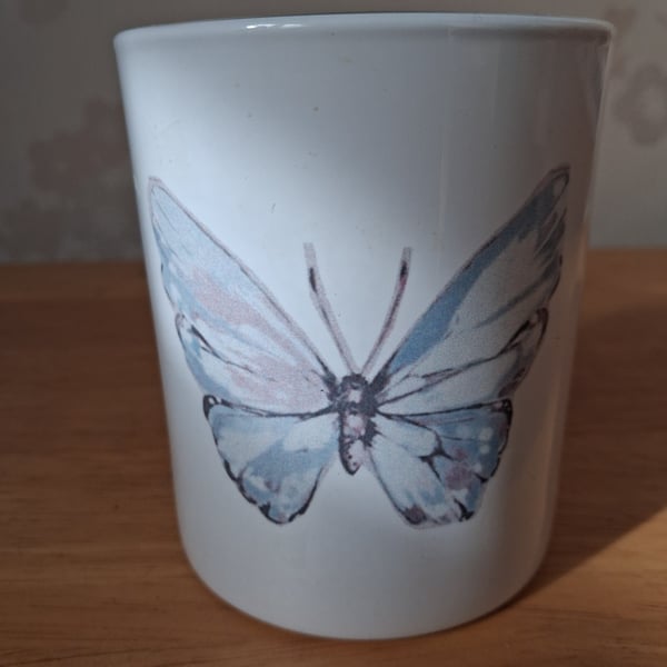 White Ceramic Candle Jar with a cute Butterfly