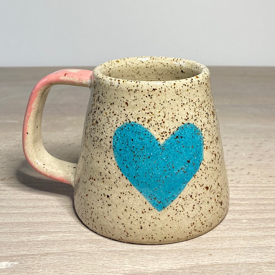 Turquoise love heart ceramic mug.