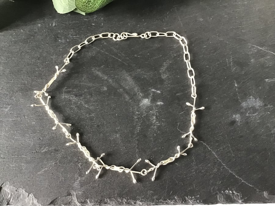 Barbie, barbed wire inspired sterling silver hand made necklace 