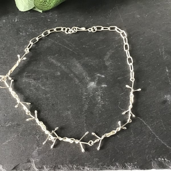 Barbie, barbed wire inspired sterling silver hand made necklace 