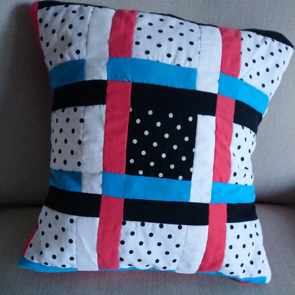 Bright cushion cover, in red, turquoise, black and white. 14x14ins 36x36cm