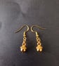Small gold acorn charm dangle earrings  - Image 1