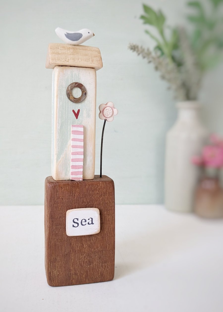 Tall Wooden Sea Hut with Clay Flower and Seagull 'Sea'