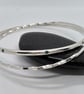 Silver Twisted Bangles with Turquoise Swarovski Zirconias - Image 1