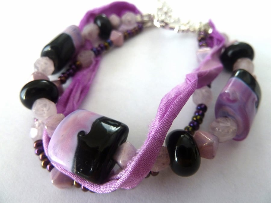 SALE three strands, purple and black